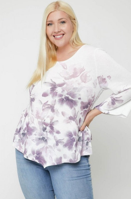 Print Top Featuring A Round Neckline And 3/4 Bell Sleeves