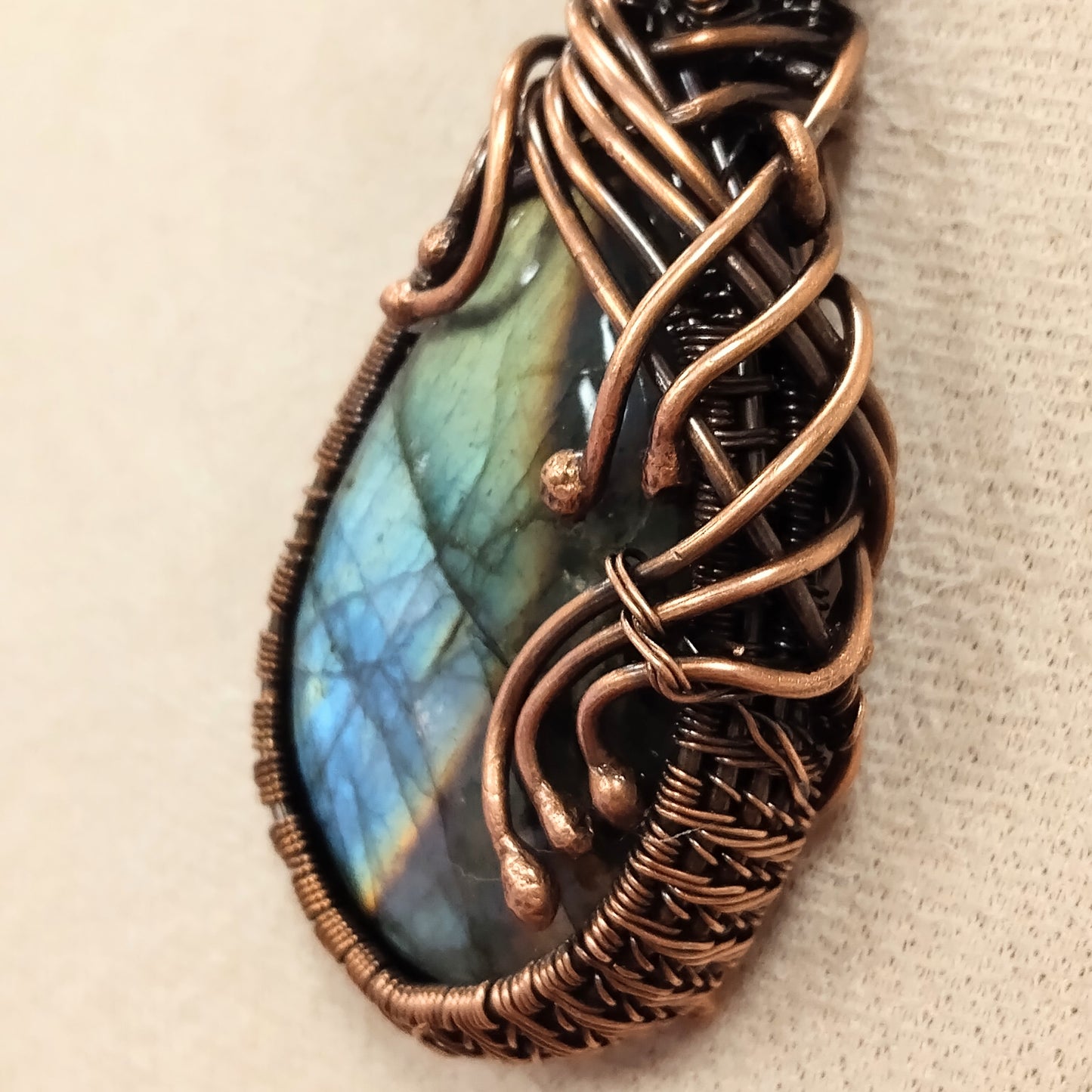 Labradorite Pendant Wrapped in a Woven Copper Bezel