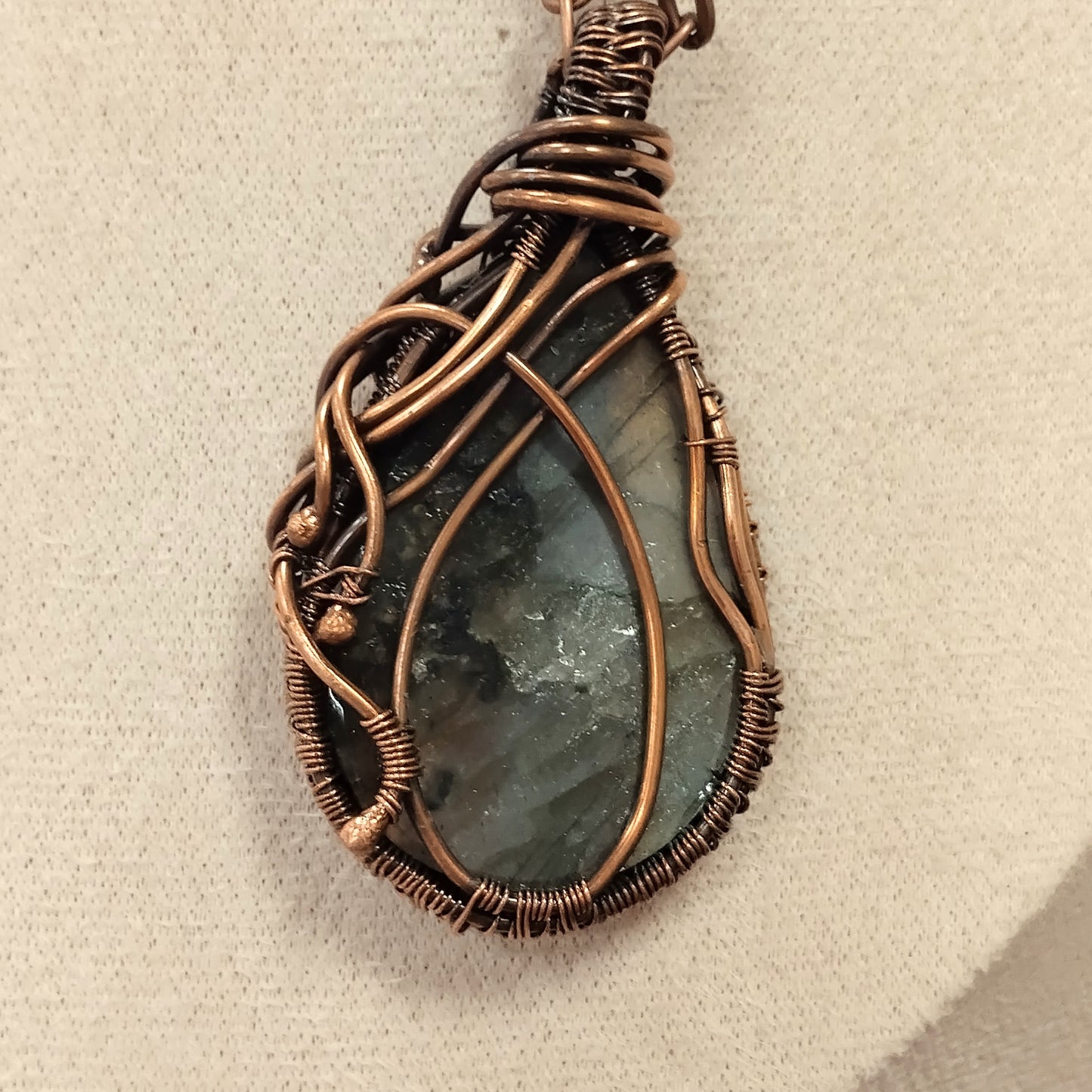 Labradorite Pendant Wrapped in a Woven Copper Bezel
